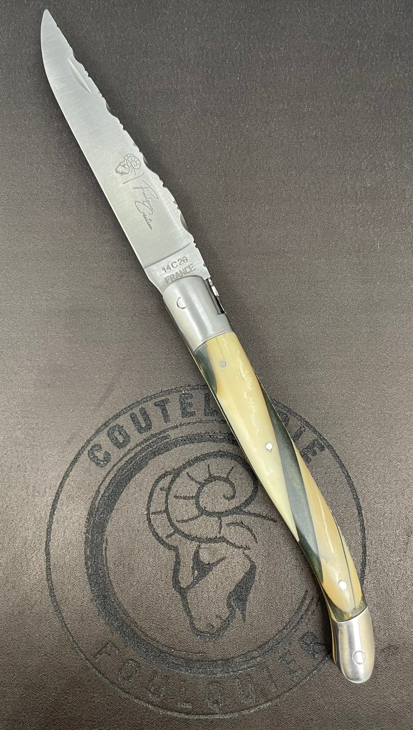 Laguiole Double Mitres Manche en Ivoire de Mammouth sous résine